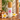 Hilo Hattie Plumeria Body Mist, made in Hawaiʻi, with bamboo cap and plumeria flowers