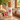 Hilo Hattie Hibiscus Passion Body Mist, made in Hawaiʻi, with bamboo cap and pink hibiscus