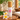 Hilo Hattie Plumeria Body Lotion, made in Hawaiʻi, with bamboo cap and plumeria flowers