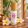 Hilo Hattie Plumeria Body Mist, made in Hawaiʻi, with bamboo cap and plumeria flowers